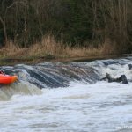 Photo of the Kings River in County Kilkenny Ireland. Pictures of Irish whitewater kayaking and canoeing. Big weir rive center left line in high water. Photo by Adrian