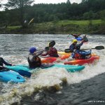 Photo of the Avonmore (Annamoe) river in County Wicklow Ireland. Pictures of Irish whitewater kayaking and canoeing. Party wave in rathdrum.low water. Photo by steve fahy