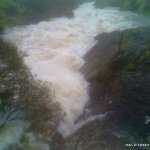 Photo of the Coomeelan Stream in County Kerry Ireland. Pictures of Irish whitewater kayaking and canoeing. Down stream from first bridge, waterfall is at horizon zine. Photo by Daith