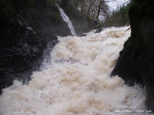  Glenarm River - Johnny running the middle drop on the Glenarm Grade 5 , in medium to high water, In my opinion any higher than this it is unrunable due to a horizontal stopper throwing you into  the far wall where rescue is impossible, That photo was taken by roger norrris in december 2007