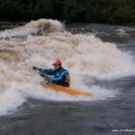 Photo of the Inny river in County Longford Ireland. Pictures of Irish whitewater kayaking and canoeing. alex stanly rippin up the meat hole. Photo by orky