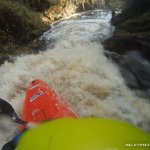 Photo of the Deele Drumkeen river in County Donegal Ireland. Pictures of Irish whitewater kayaking and canoeing. Half way down the main slide.. Photo by Stu Hamilton