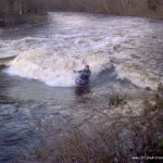 Photo of the River Roe in County Derry Ireland. Pictures of Irish whitewater kayaking and canoeing. Same wave as previous pic from different angle.. Photo by Stu Hamilton