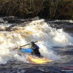 Photo of the Inny river in County Longford Ireland. Pictures of Irish whitewater kayaking and canoeing. Andy Sheils enjoyin factory hole.