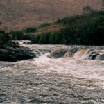 Photo of the Erriff river in County Mayo Ireland. Pictures of Irish whitewater kayaking and canoeing. First drop. You can just make out a paddler following the RL to RR line.. Photo by Graham