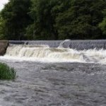 Photo of the Liffey river in County Dublin Ireland. Pictures of Irish whitewater kayaking and canoeing. Lucan weir panorama. Photo by Kyle Tunney