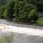 Photo of the Liffey river in County Dublin Ireland. Pictures of Irish whitewater kayaking and canoeing. Lucan weir panorama 2. Photo by Kyle Tunney