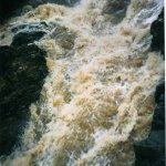 Photo of the Mayo Clydagh river in County Mayo Ireland. Pictures of Irish whitewater kayaking and canoeing. Main drop, Upper Section. High Level (It just flushes through though.No brainer!). Photo by Graham