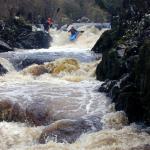 Photo of the Flesk river in County Kerry Ireland. Pictures of Irish whitewater kayaking and canoeing. Muireann Lynch running of the finger drop.. Photo by Mickey