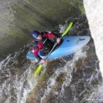 Photo of the Lower Corrib river in County Galway Ireland. Pictures of Irish whitewater kayaking and canoeing. Waiting to surf… eddy river-right of O'Brien's wave. Photo by Sorcha Schnittger