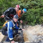 Photo of the Boluisce river in County Galway Ireland. Pictures of Irish whitewater kayaking and canoeing. Foot bridge – very high water in August 2008. Photo by Ross Lynch