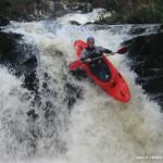 Photo of the Owengar river in County Cork Ireland. Pictures of Irish whitewater kayaking and canoeing. Ian on second drop with first drop in the background. Photo by Sara