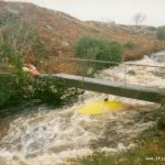 Photo of the Boluisce river in County Galway Ireland. Pictures of Irish whitewater kayaking and canoeing. The Foot bridge. Sometimes if the level is very high you have to duck going under it. . Photo by Seanie
