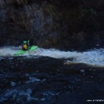 Photo of the Roogagh river in County Fermanagh Ireland. Pictures of Irish whitewater kayaking and canoeing. Lee Doherty (LYIT CC) about to go over the midddle drop. note padddler at bottom. Photo by lee doherty. letterkenny IT canoe club (LYITCC)