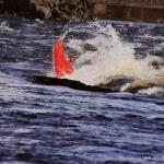 Photo of the Lower Corrib river in County Galway Ireland. Pictures of Irish whitewater kayaking and canoeing. Alan Moore aka Moogie, top hole Rapids, mid loop. Photo by Jackie Ferguson