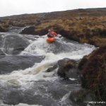 Photo of the Owenvehy river in County Donegal Ireland. Pictures of Irish whitewater kayaking and canoeing. Ray Doherty on the first few drops.. Photo by Stu Hamilton